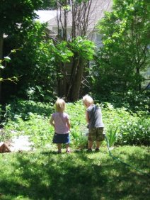 Our nephew & niece, Micah & Hannah, enjoy the garden.