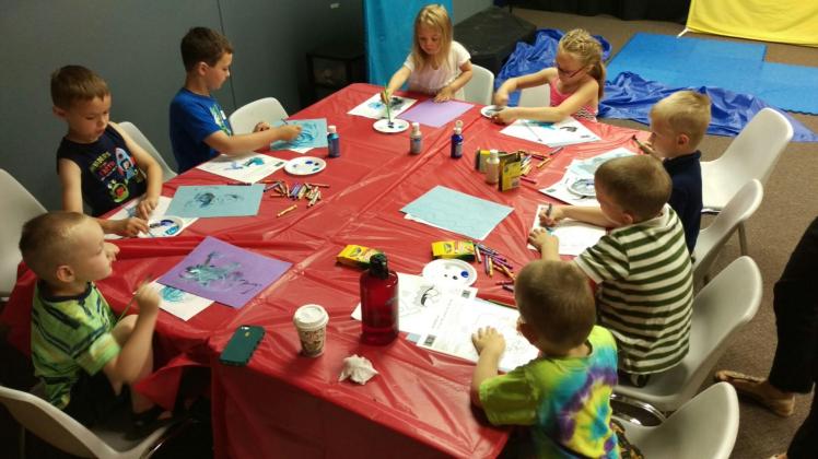 This recent Sunday School photo shows one person short of our own future ball team!