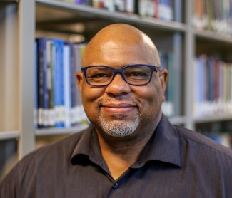 DRE-headshot1-scaled